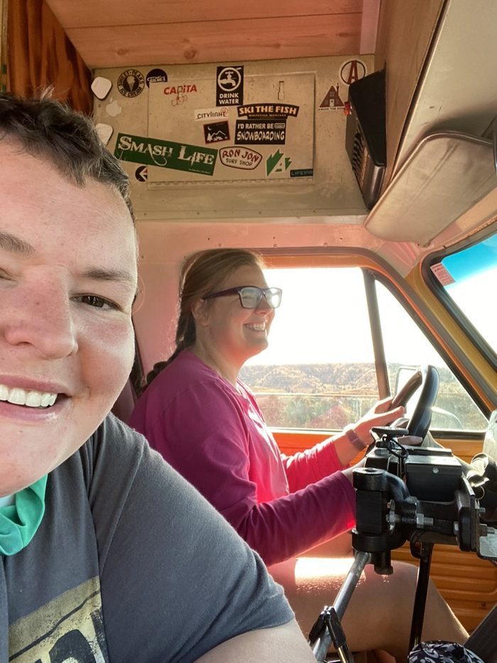 Robyn at the wheel of Gus, Amanda in the passenger seat taking the photo.